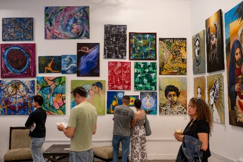 A crowd filling a gallery in the Historic Core on ArtNight.